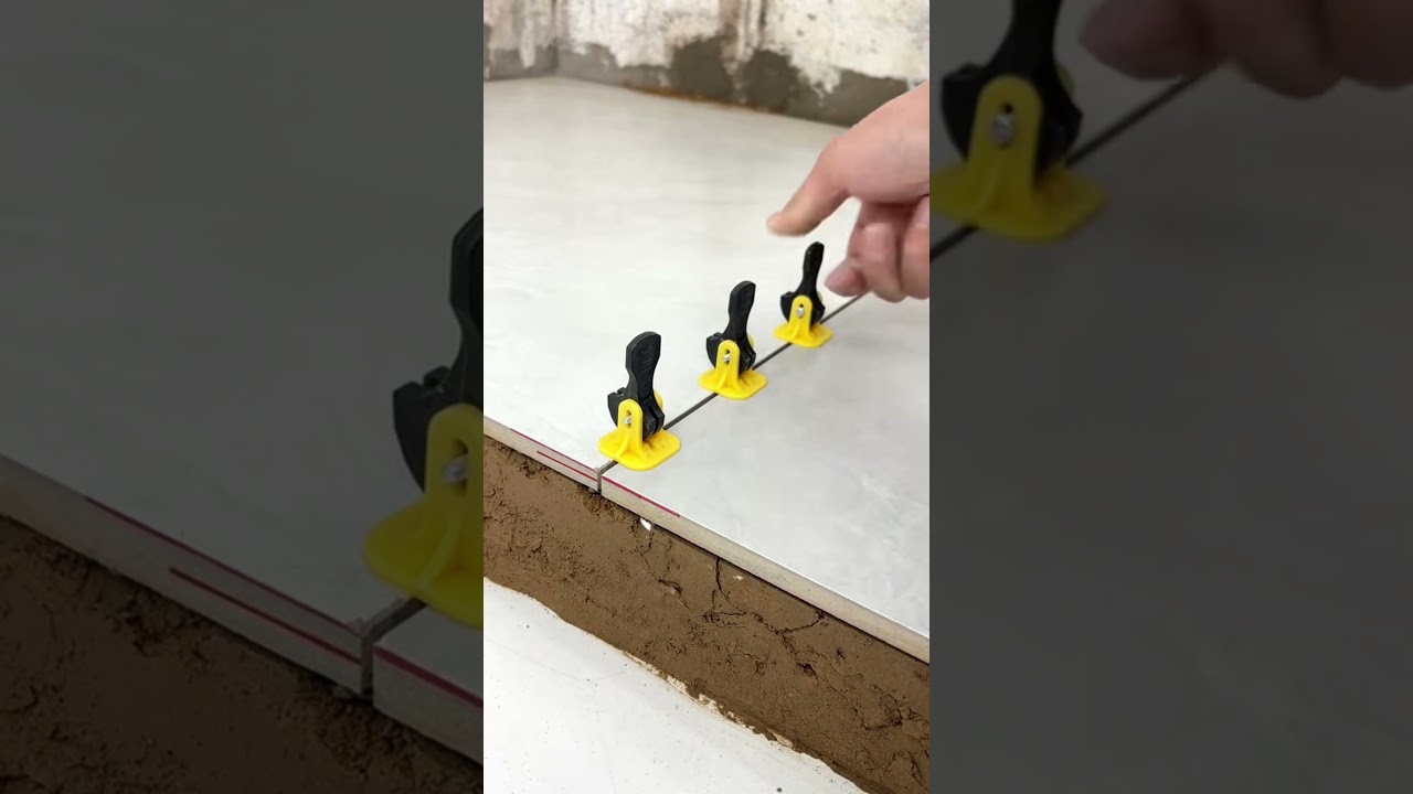 Reusable T-Lock Tile Leveling System