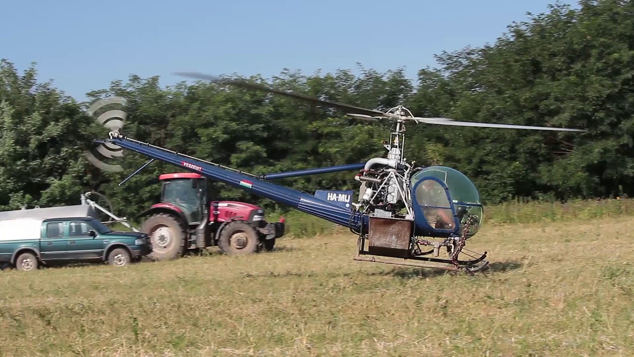 UH-12 Hiller spraying sunflower near Kaposvár, Hungary