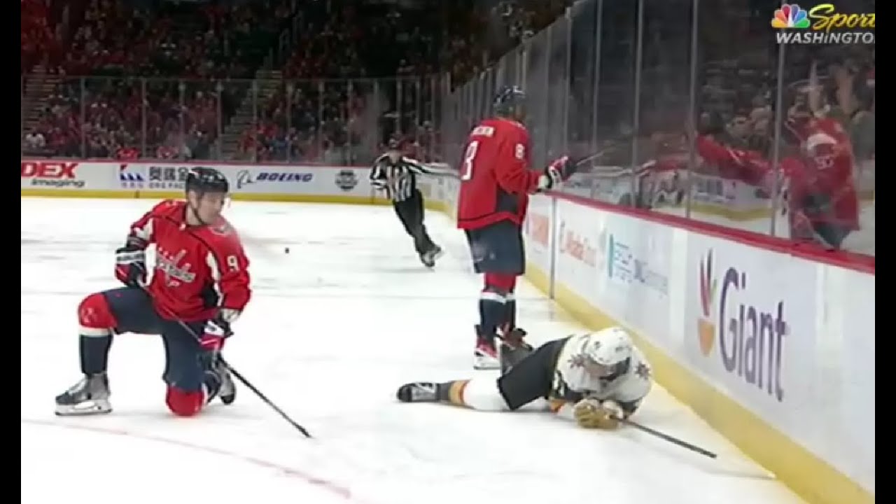Nolan Patrick flies to the boards after a shoulder hit by Ovechkin