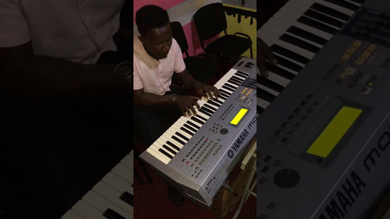 Nsanku on Piano in the studio