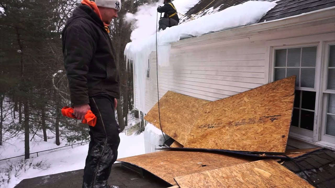 Minneapolis Ice Dam Removal and Roof and protection on the roof.
