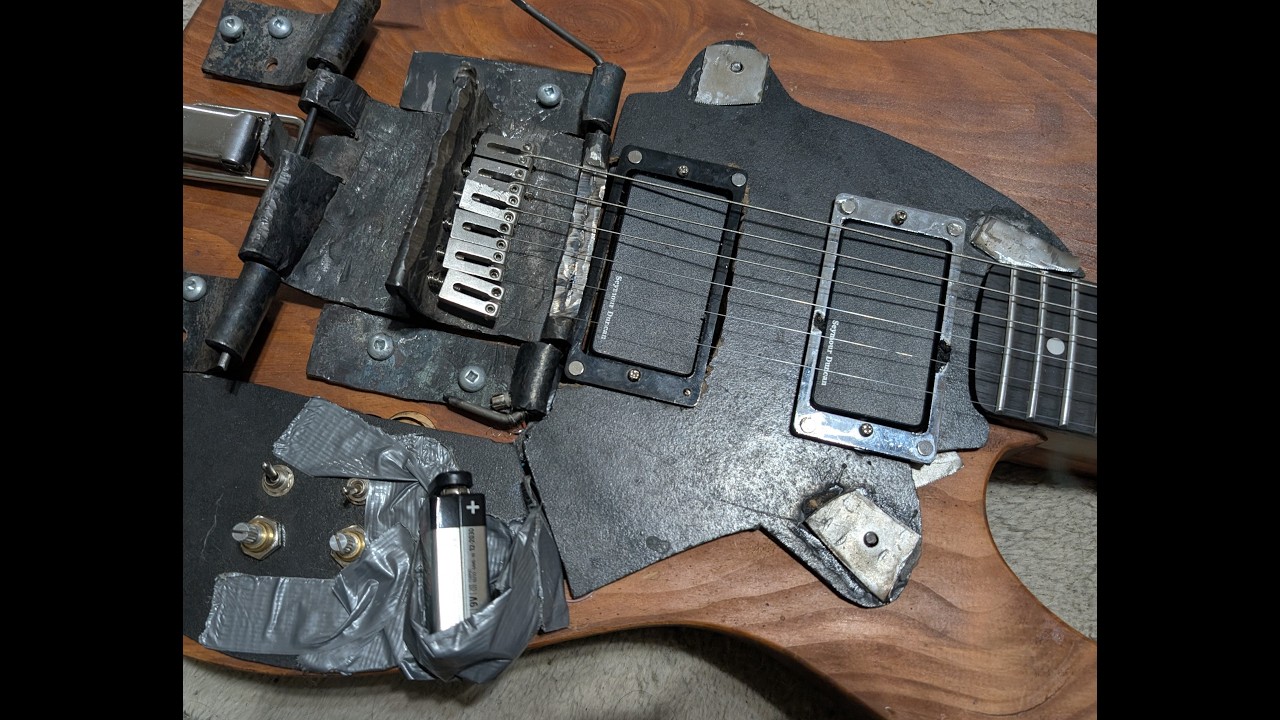 Fast Pickup change - hinging guitar bridge.  Redneck caster concept.