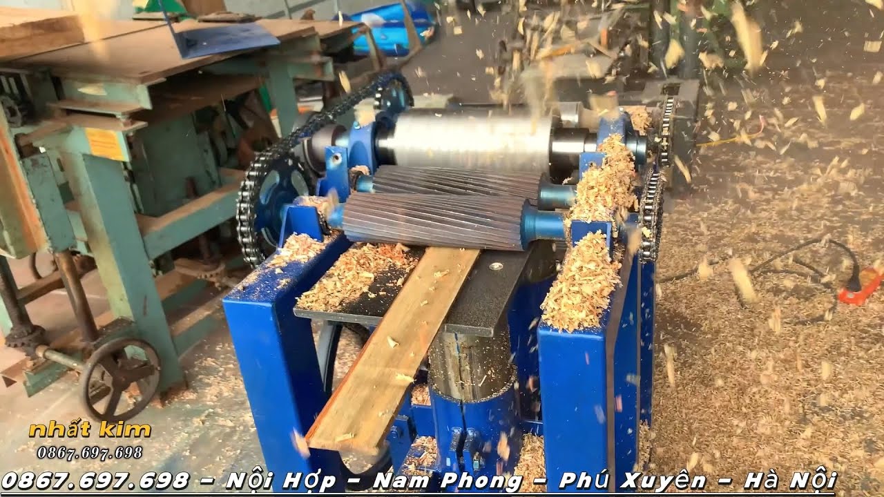máy cuốn trục hạt