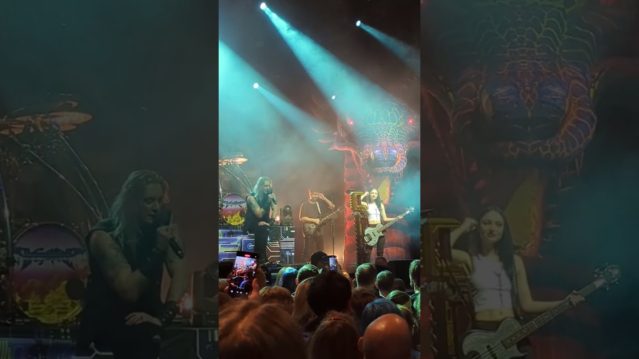 DragonForce singer Marc Hudson arguing on stage with rude fans, refusing to finish the set in Riga