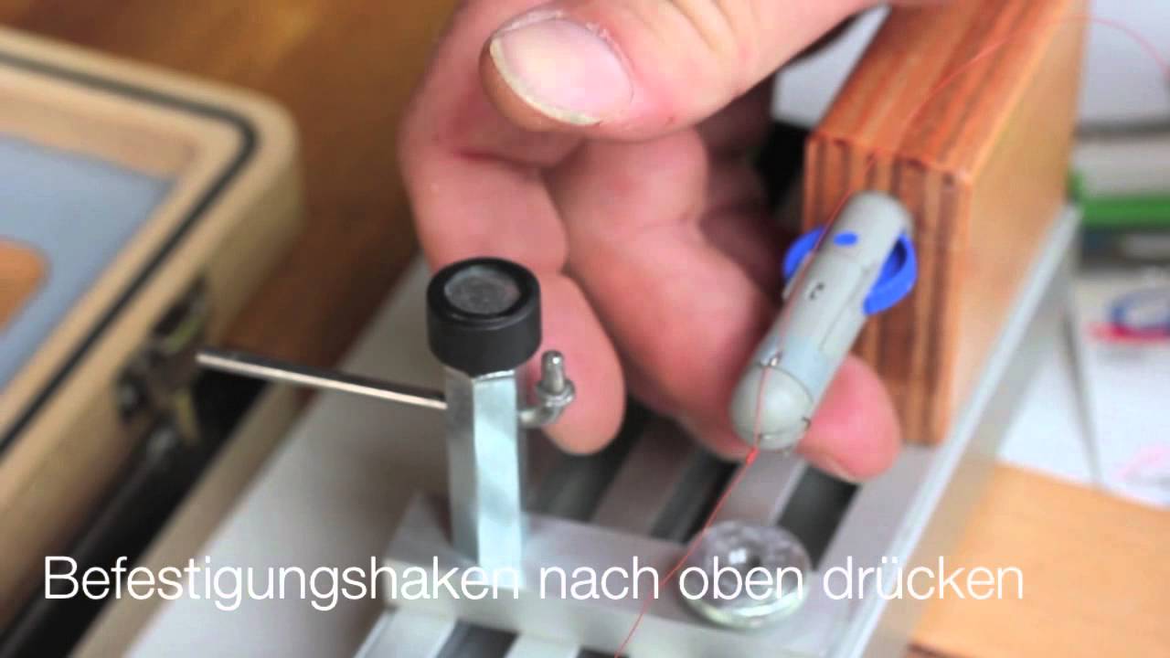 Hakenbindegerät - Haken mit Pellet-Gummi binden