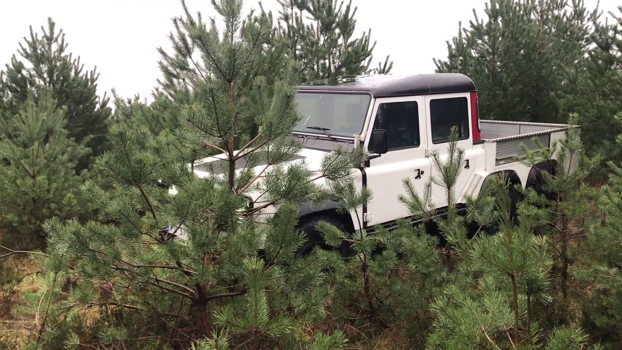 Land Rover Defender 6x6 in the norwegian forest
