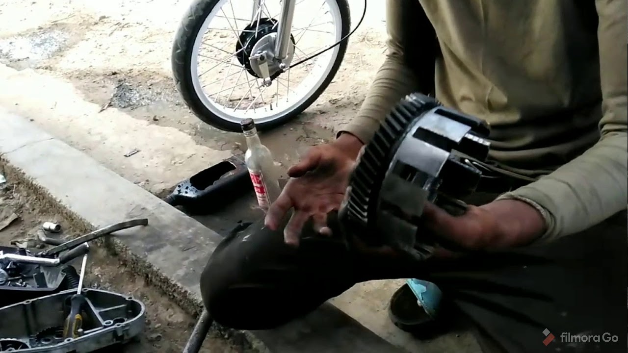 Remachando campana de cloche de suzuki AX 100