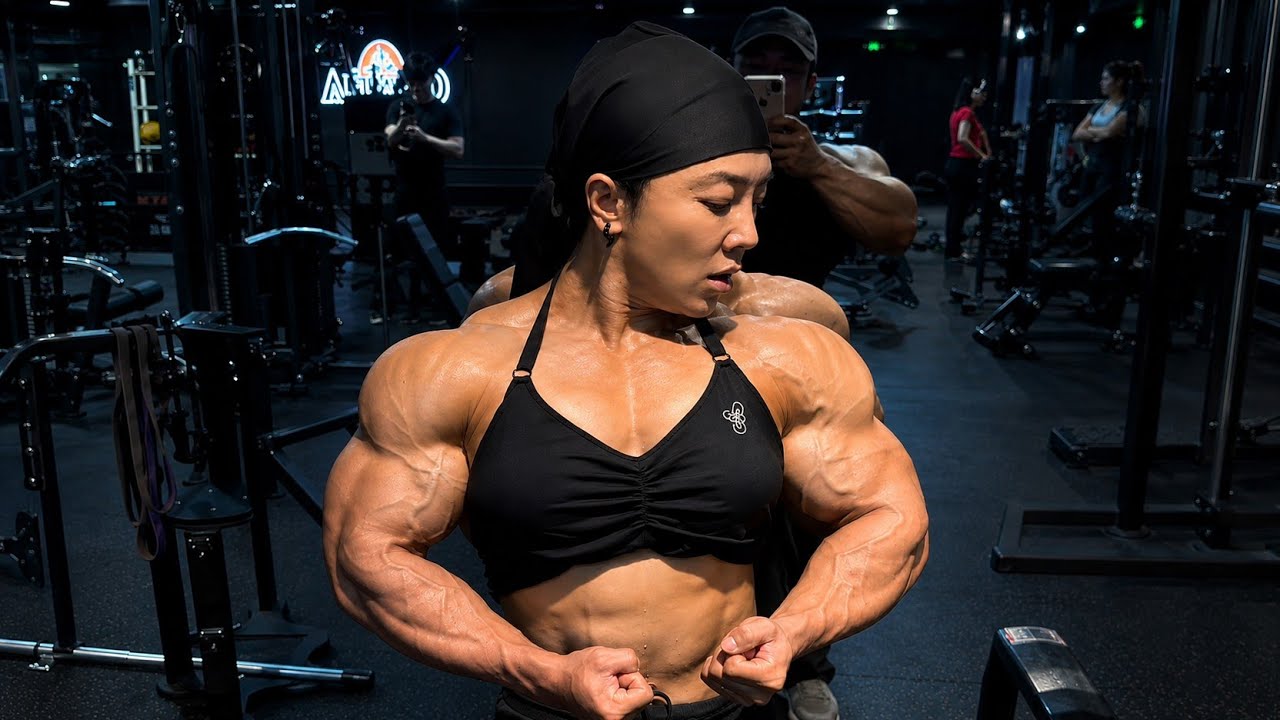 Yan Hong | IFBB Pro Women's Physique Bodybuilder & Olympia Competitor. 