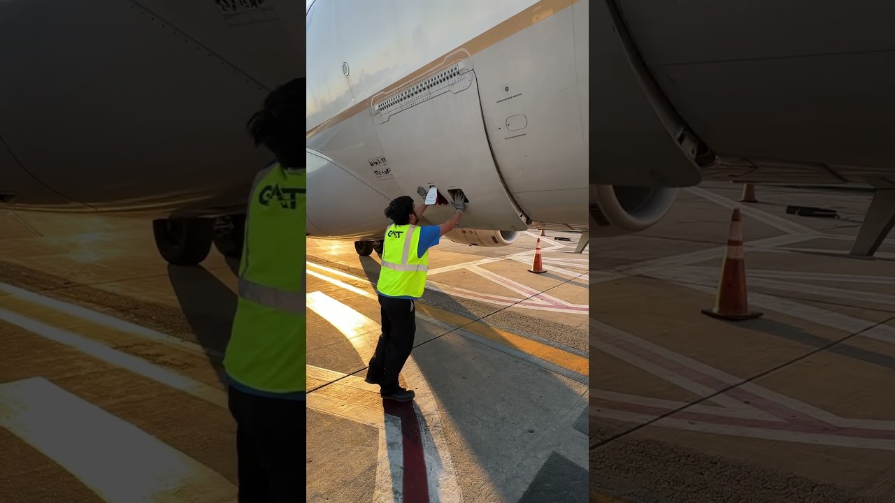 Closing the cargo door on an ERJ-175! #aviation #erj #shorts