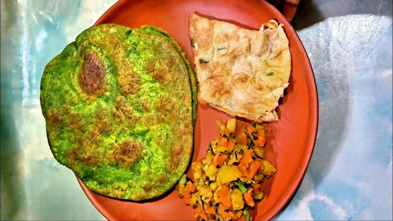 সকালের নাস্তায় আপনারাও বানিয়ে নেন পালন শাকের পরোটা,ডিম ভাজি, গাজর ও আলু ভাজি।