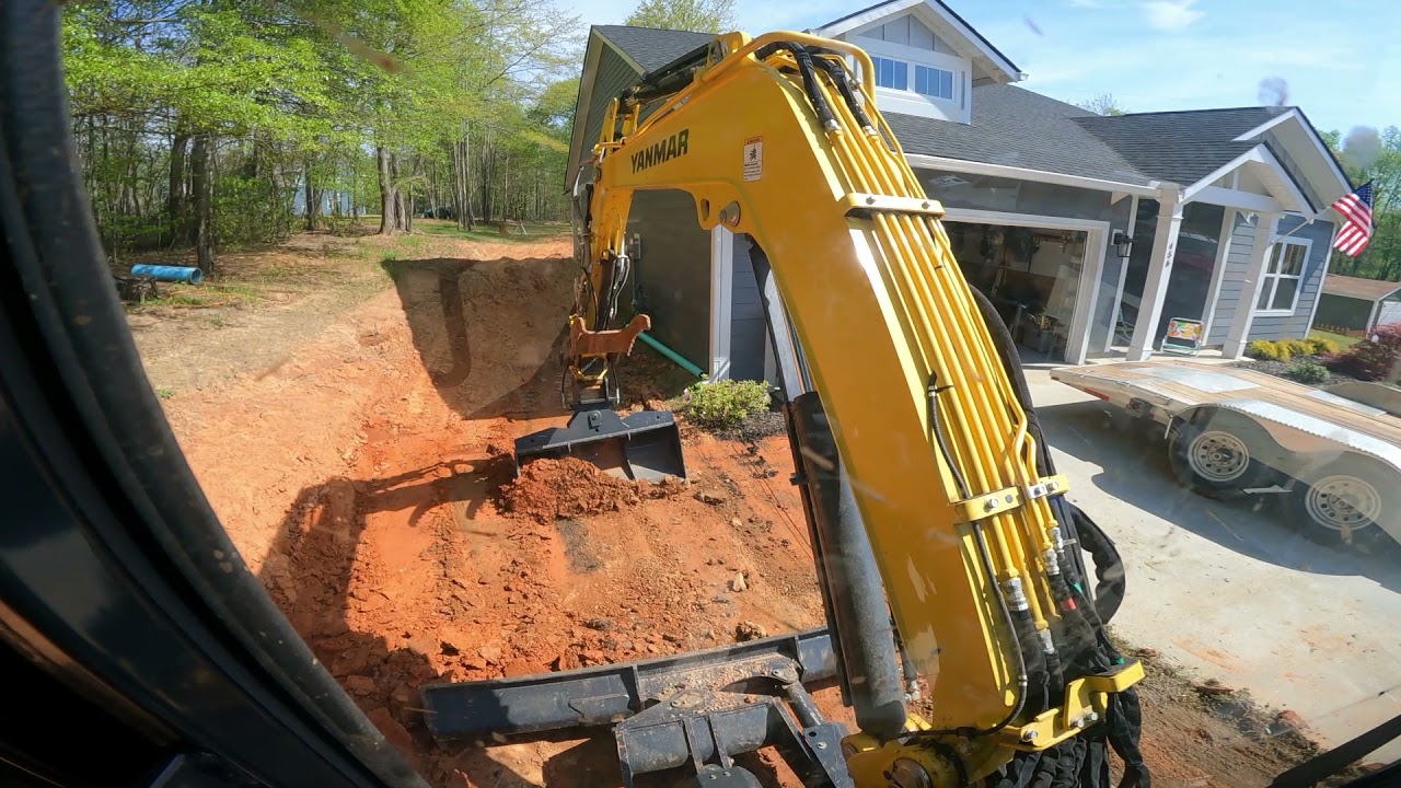 Tilt 50” bucket on a YANMAR VIO55 Driveway project April 14,2021
