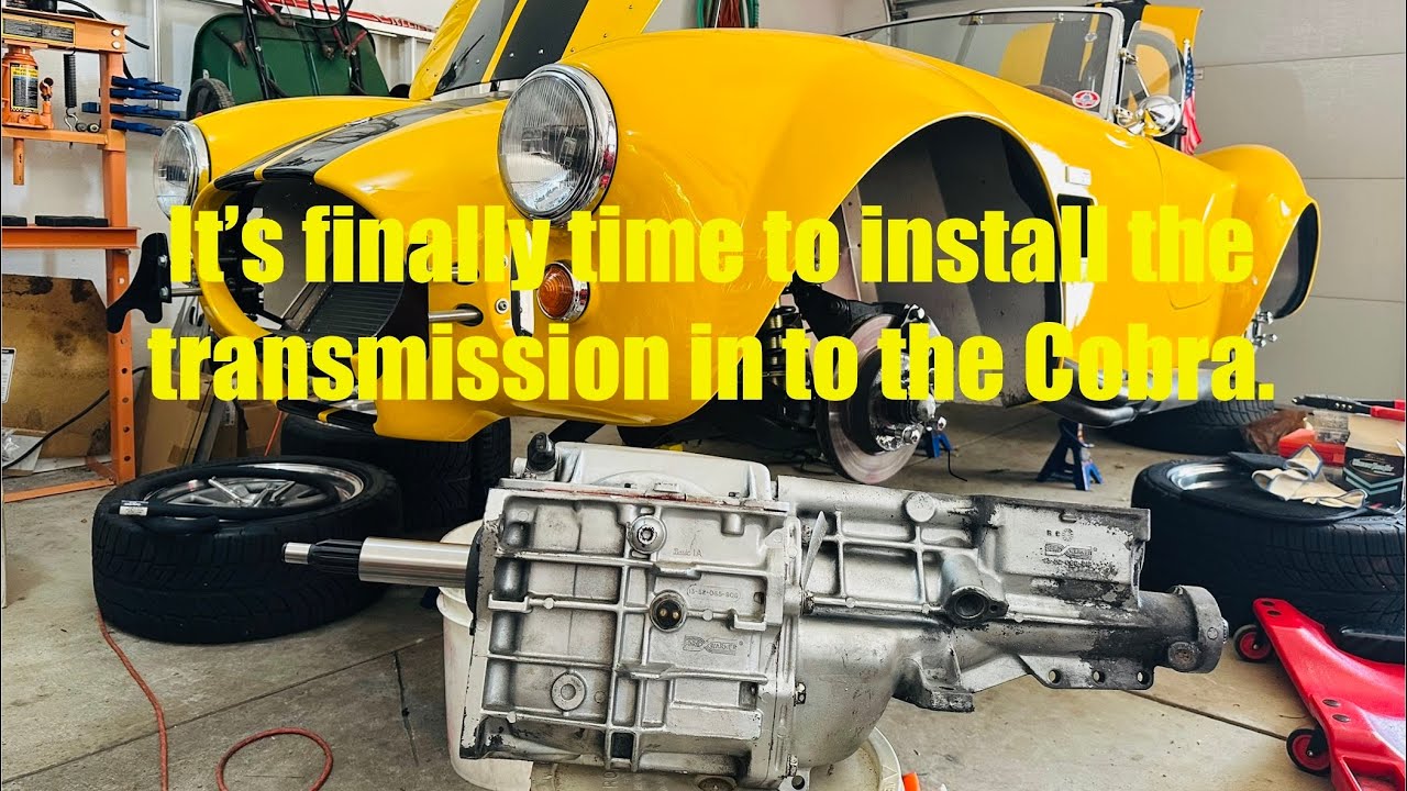 Factory Five Racing Shelby 427 S/C Cobra Roadster - installing the rebuilt T5 transmission & mount.