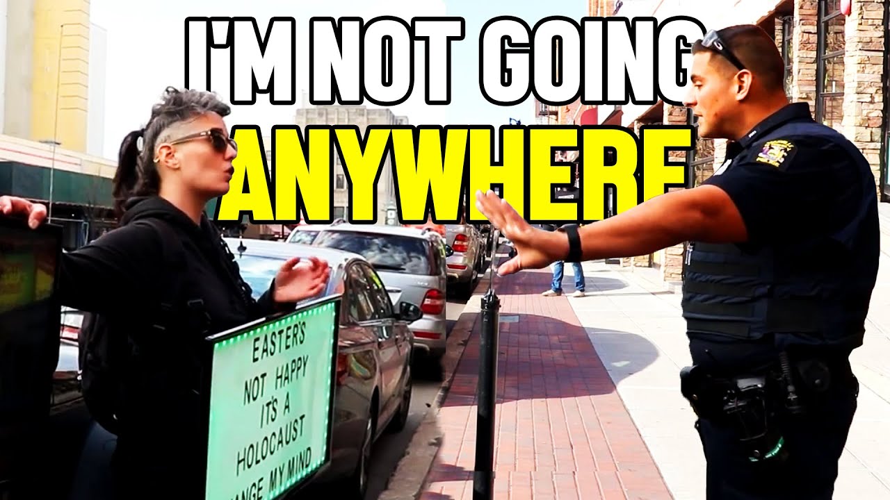 Fearless Protestor Forces Cops To BACK DOWN