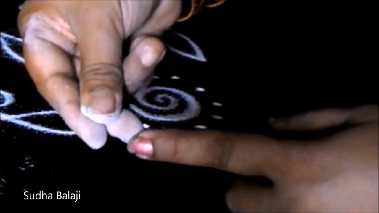 How to hold and release rangoli powder |  Sudha Balaji muggulu