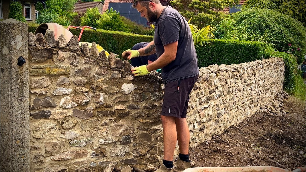 TURNING A GRASS BANK BACK INTO A STONE WALL!