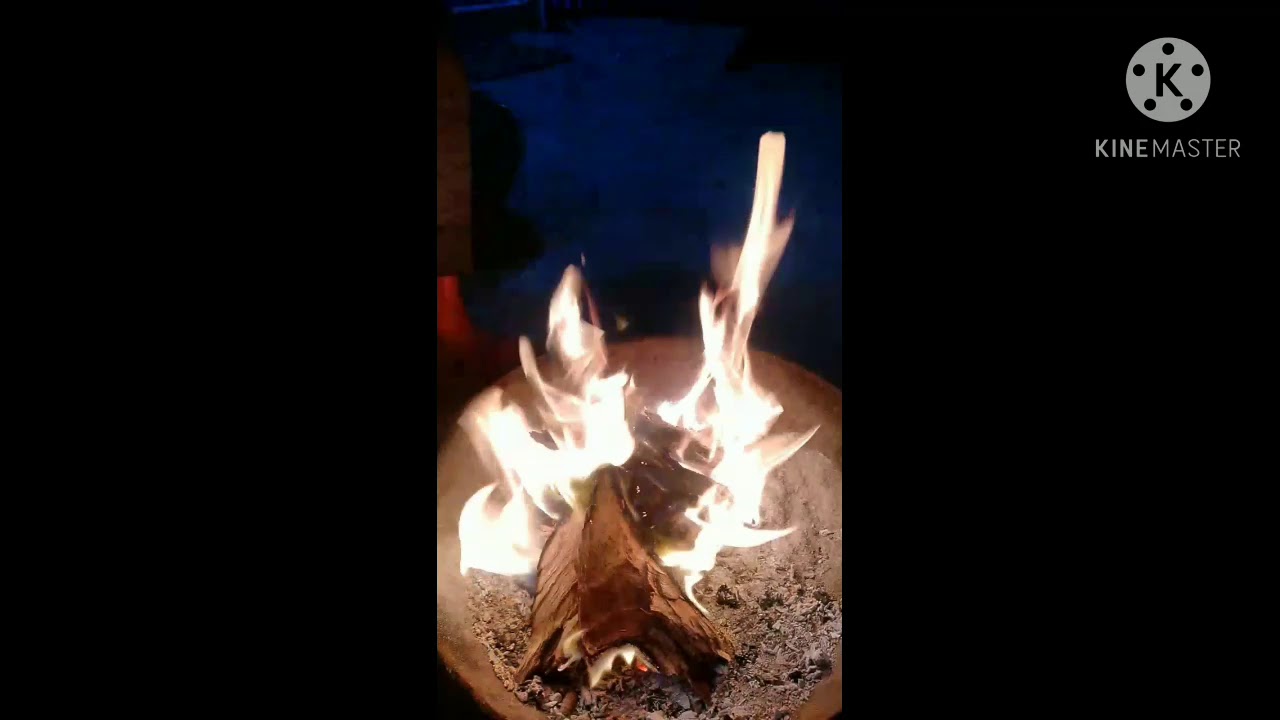 enjoying bonfire in village