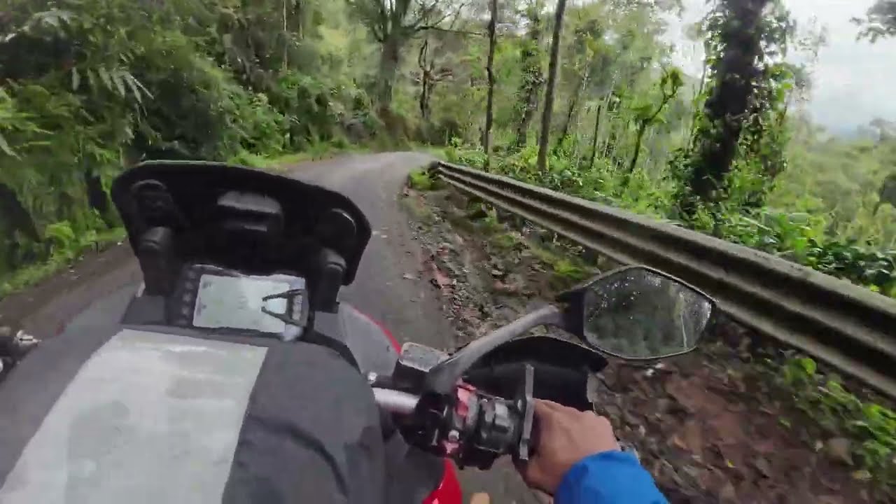 POV of an unexplored western ghats on a motorcycle