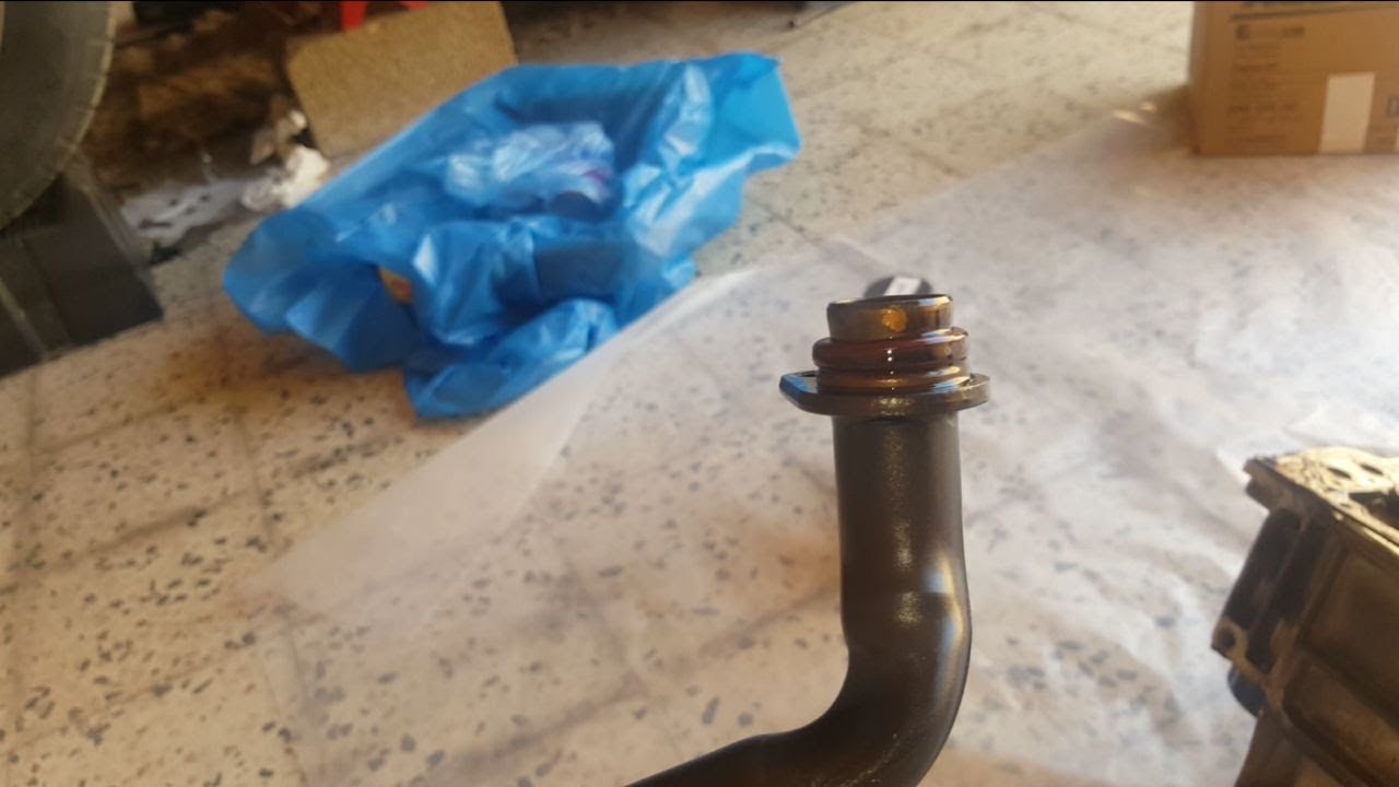 تغيير جلدة الشخال مع وجة غطا الكارتير ل سلفرادو oil pump pickup tube o ring replacement vortic 5.3