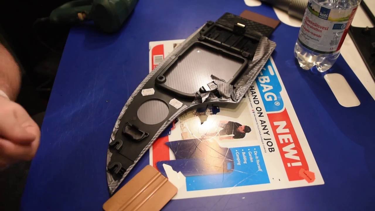 BMW 5-series interior trim wrapping with carbon fibre