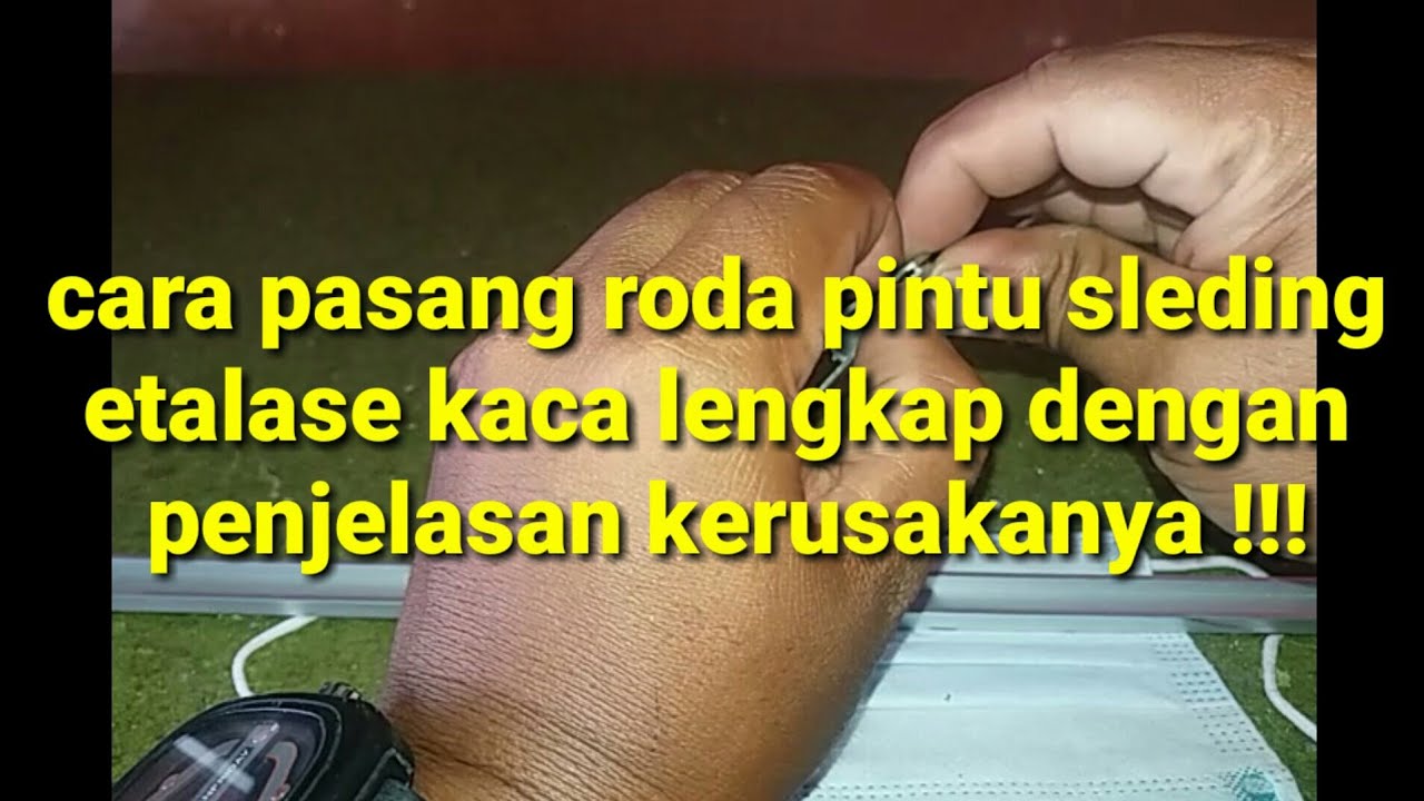 Roda pintu etalase kaca