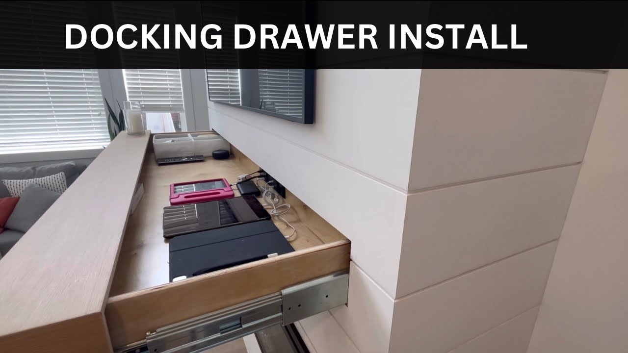 Docking drawer in fireplace mantle