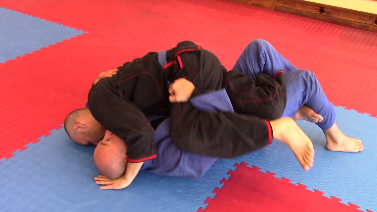 Video 8 - Side Control Escape Bridge and Roll Series