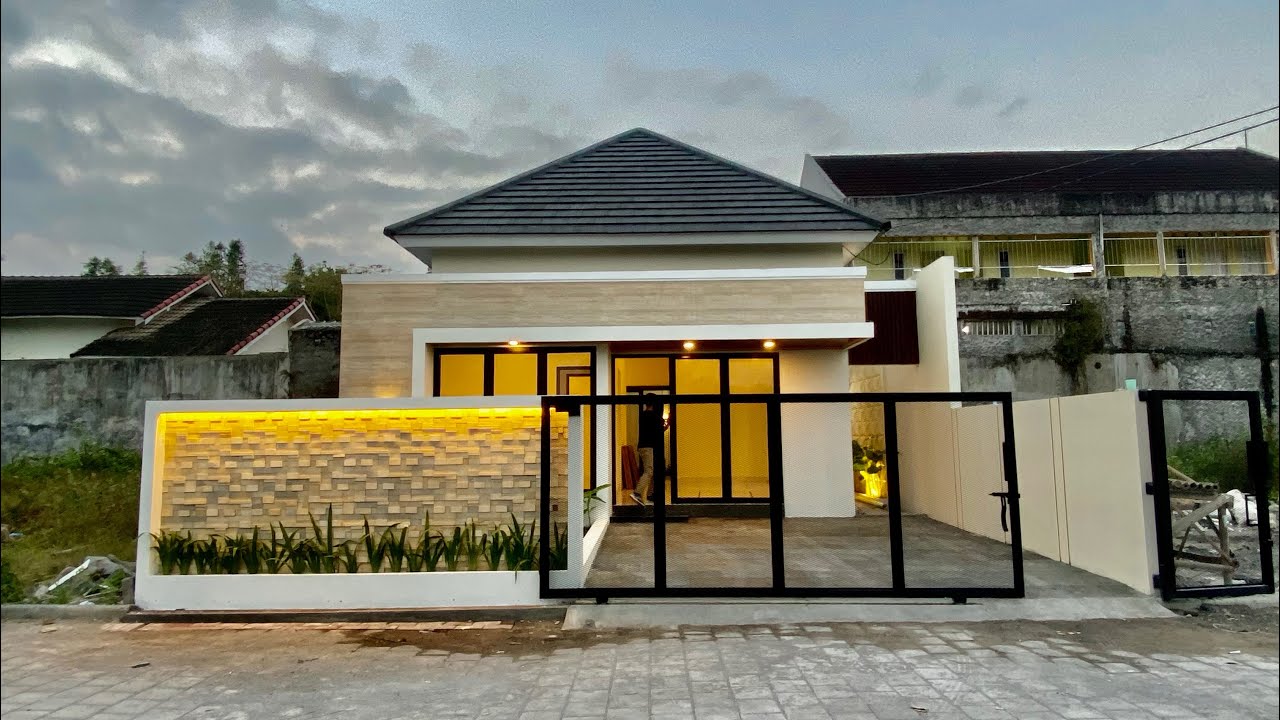RUMAH MODERN TROPIS DI JOGJA UTARA TATA RUANG LEGA