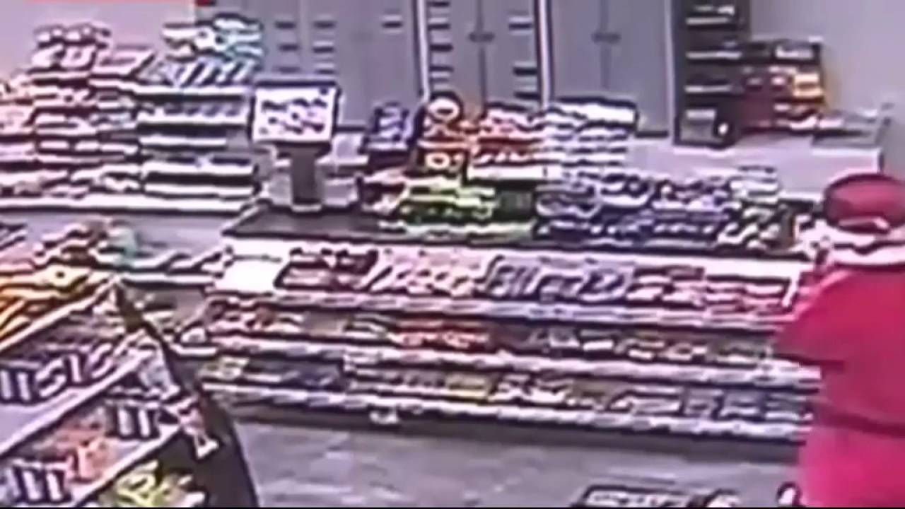 Men rob a petrol station dressed as Santa and Spiderman