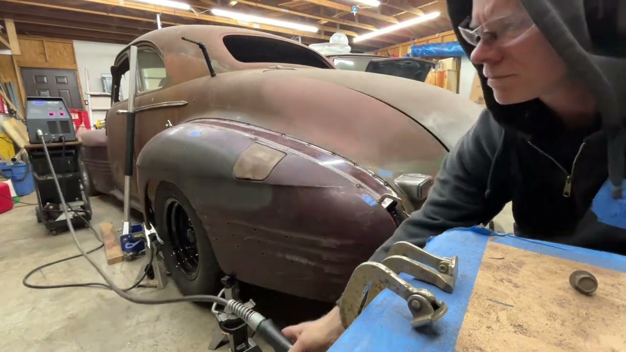 Widen driver side rear fender