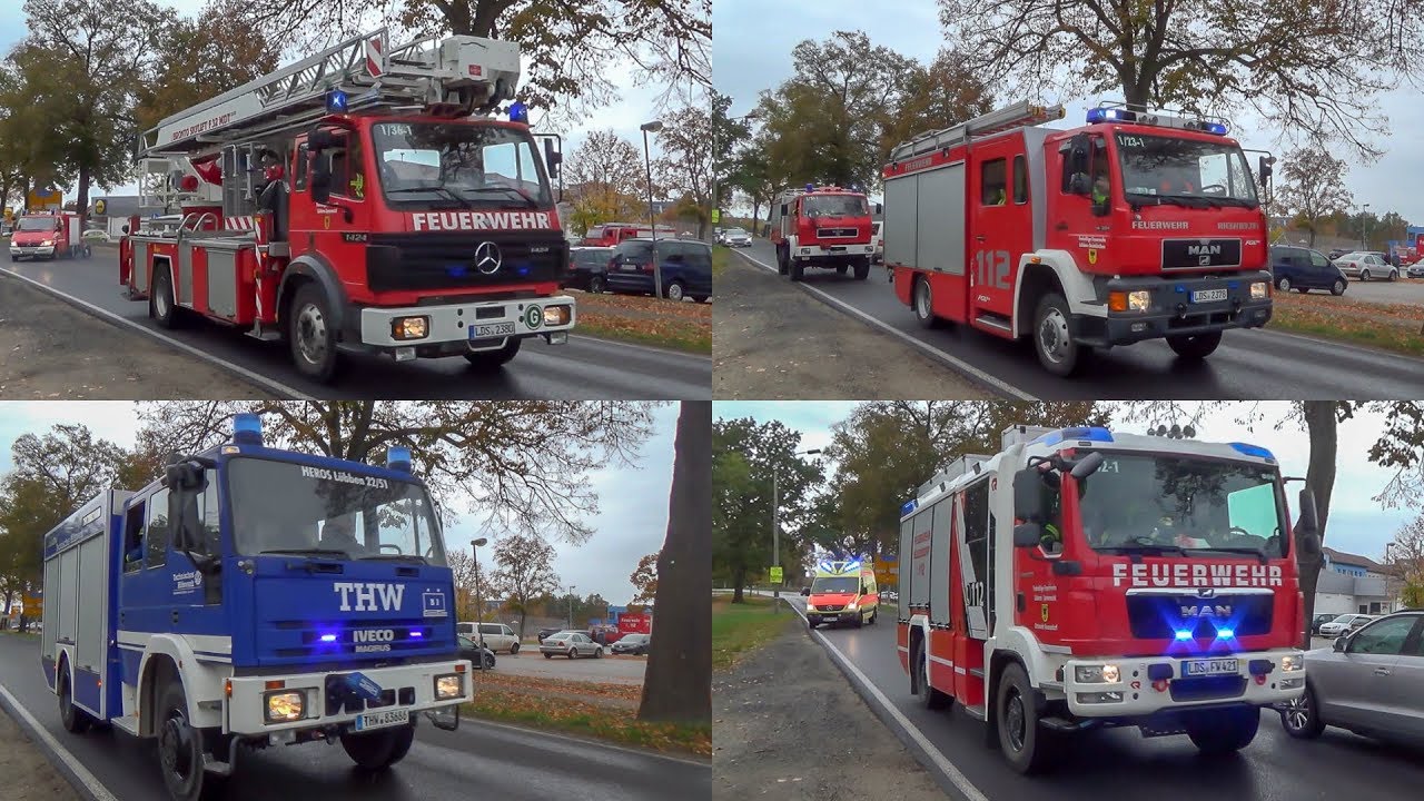 (Brand im Rathaus) Einsatzfahrten von Feuerwehr, THW und Rettungsdienst zum Gebäudebrand