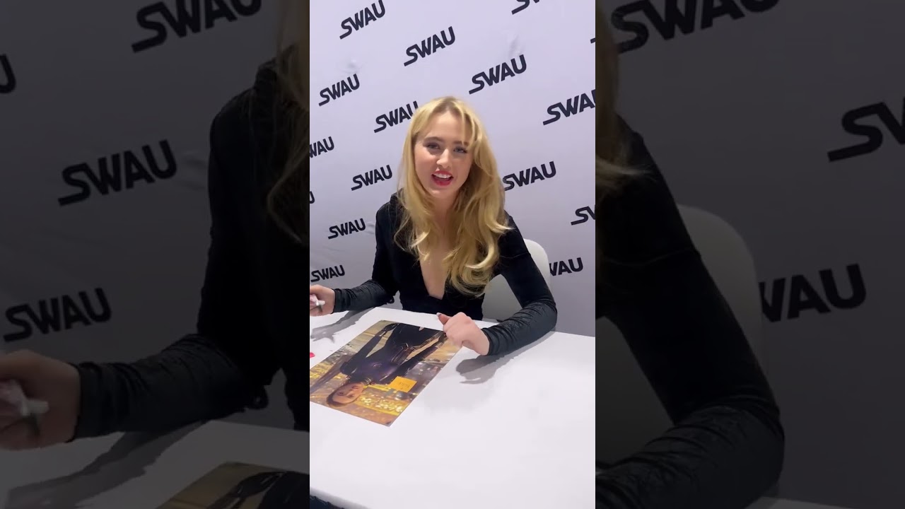 Kathryn Newton signing autographs