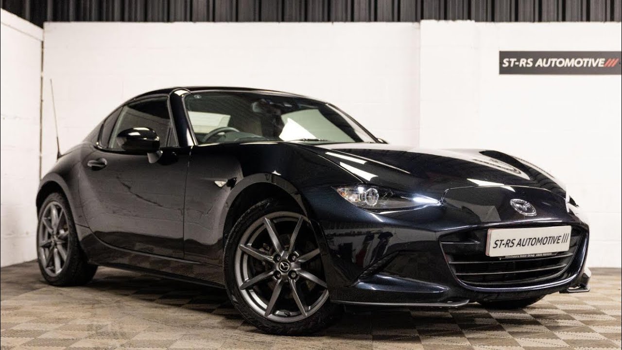 Mazda MX5 2018 года выпуска, цвет Jet Black Mica, пробег 36 000 миль.