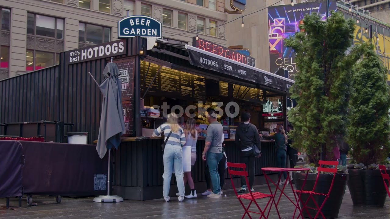 Beer Garden Fast Food Stall On A Rainy Day In Times Square, New York City, USA