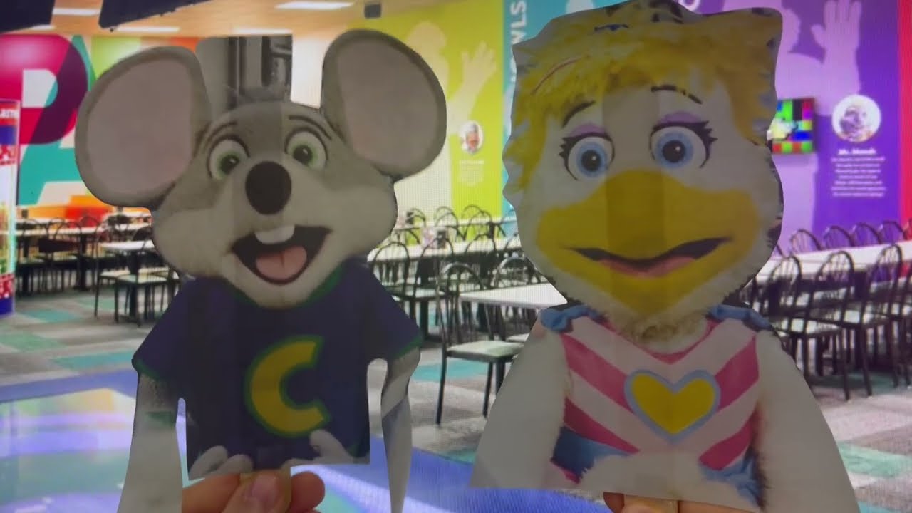 Chuck E. and Helen Play with Puzzles