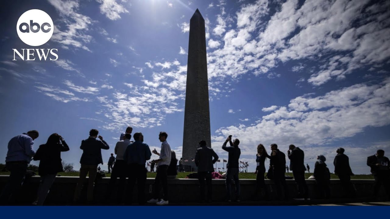 The best moments from the solar eclipse that brought weddings, tears and cheers