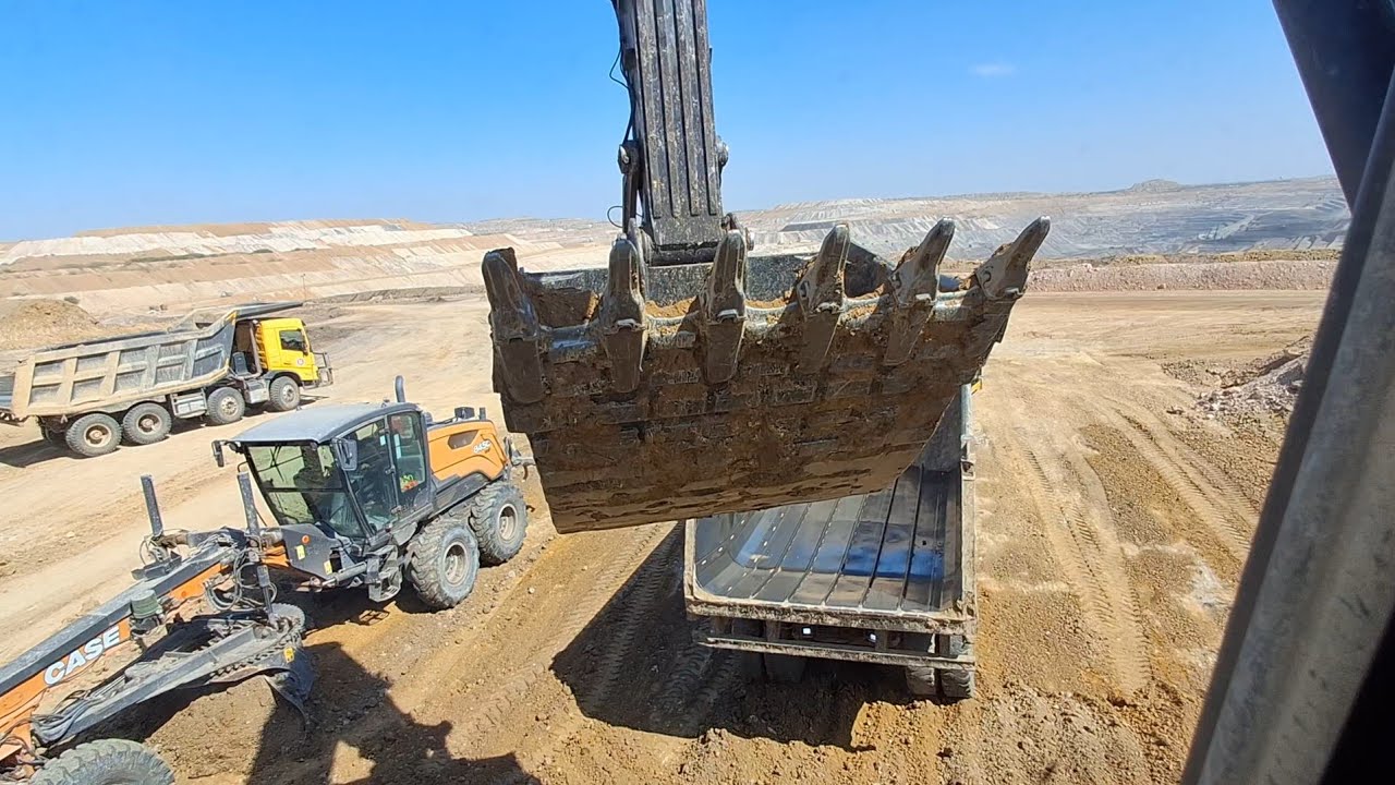 #video digging a pond with an excavatordigging with skid steerloading dump trucks backhoe digging