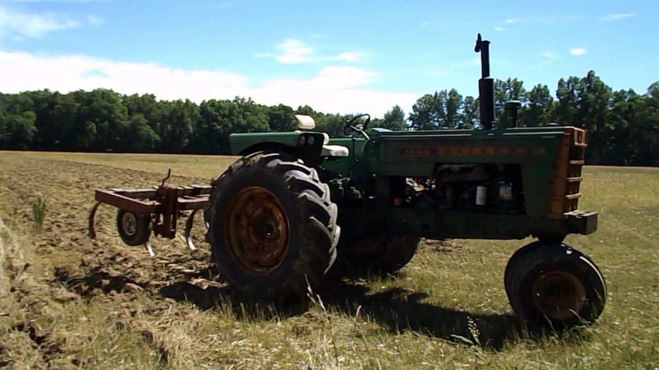 Oliver 1850 diesel first field work Pulling 11 Shank IH Chisel Plow