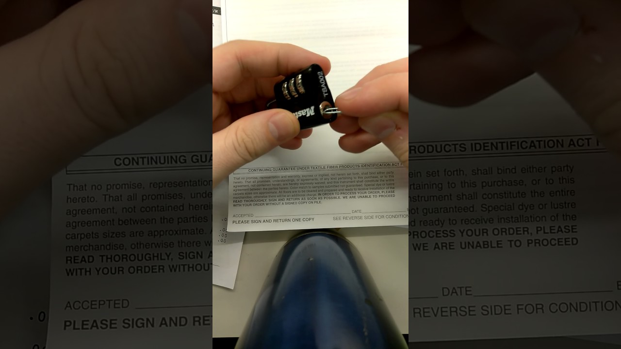 TSA 002 lock opened with paperclip