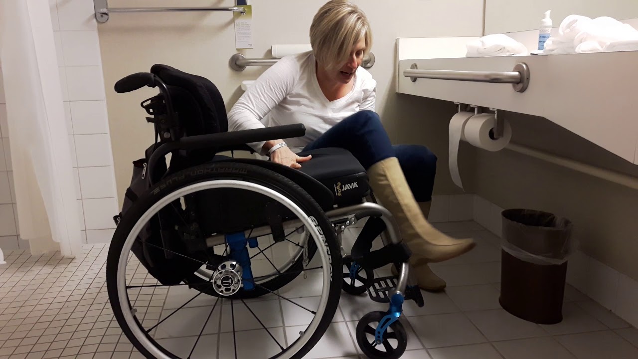 Toilet to wheelchair transfer post SCI