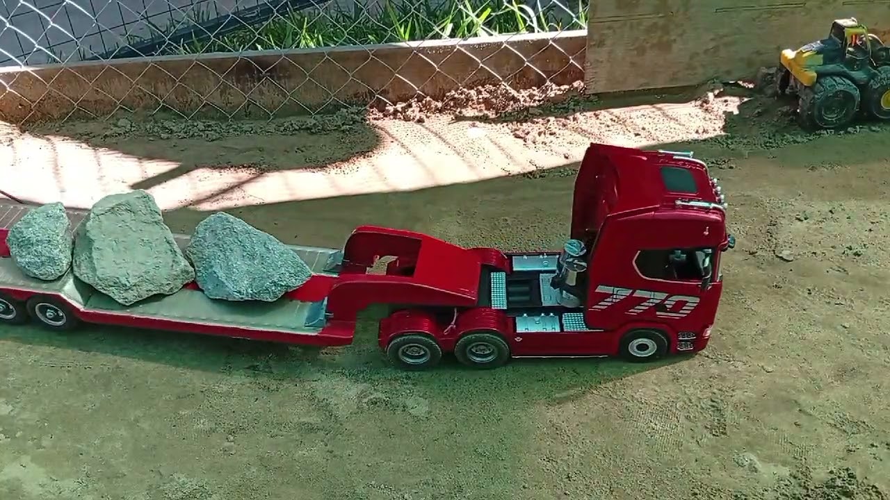 Carregamento de pedra prá fazer ponte parte 1 