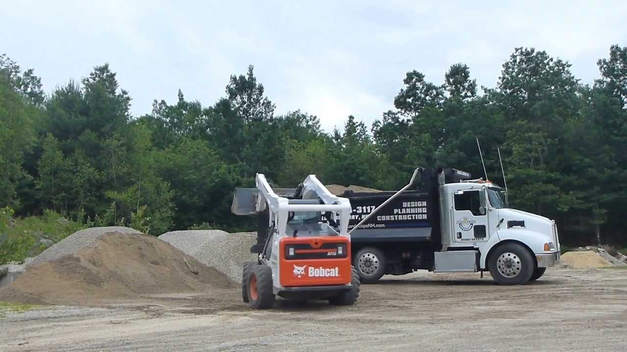 Bobcat A770 Loading Dump Truck