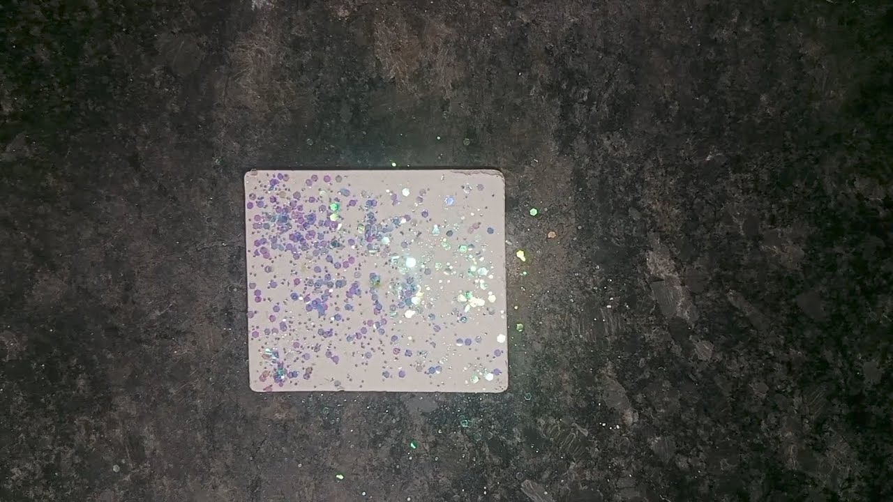 Block topped with sea / blue purple glitter crushed by my brother for #guestcrushasmr 