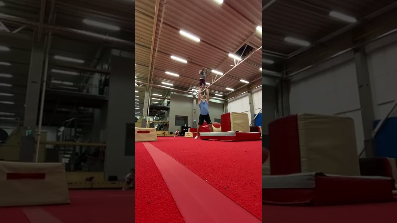 Toddler Accompanies Gymnast Dad While He Practices Cool Tricks - 1182740