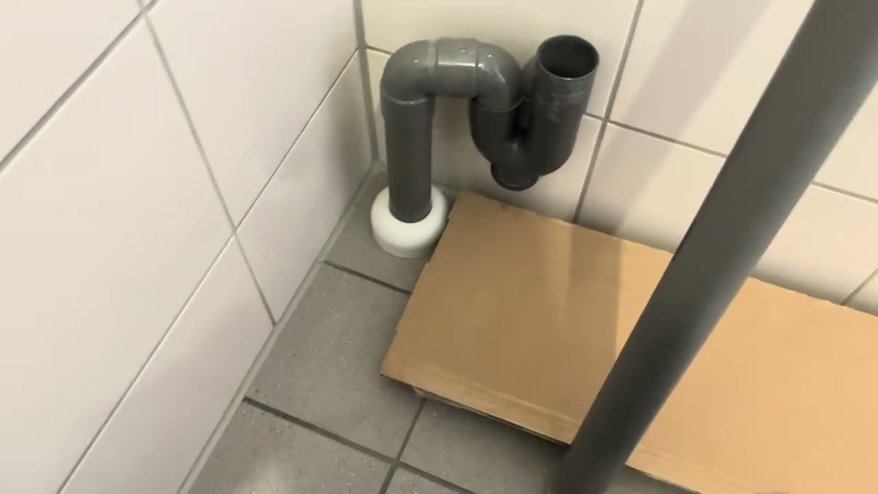 Wasmachine afvoer monteren
