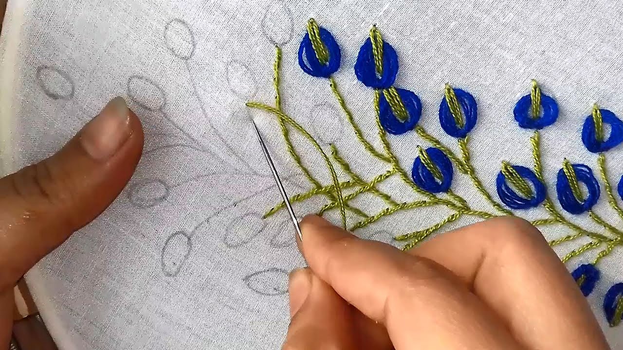 Hand Embroidery:  embroidery design with lazy daisy stitch.