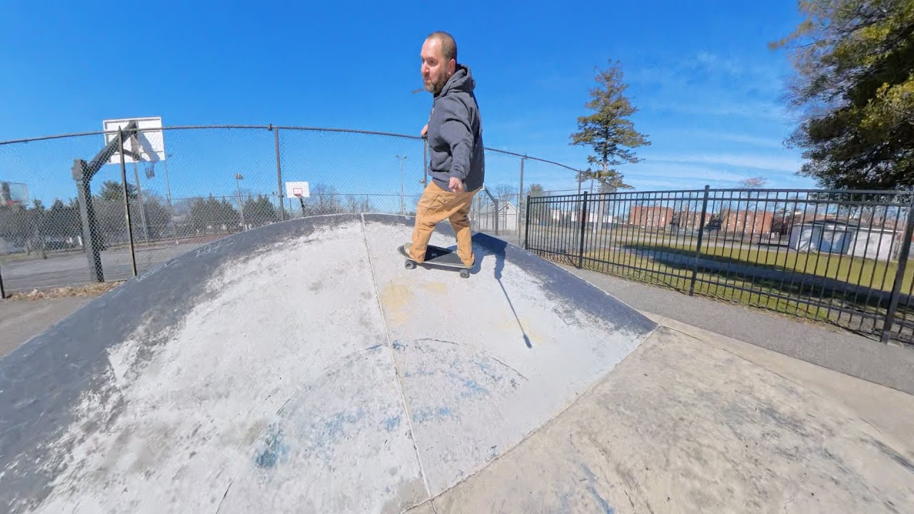 Riding banks at skatepark on Nalu surf skate - reliving Youth Crew memories in my 40s