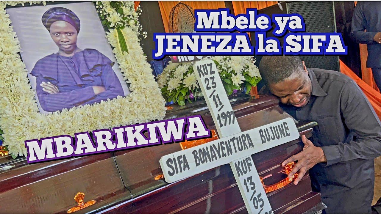Mbarikiwa APIGA GOTI MBELE ya JENEZA la SIFA AIBUSU PICHA ya MWANAE kwa HUZUNI