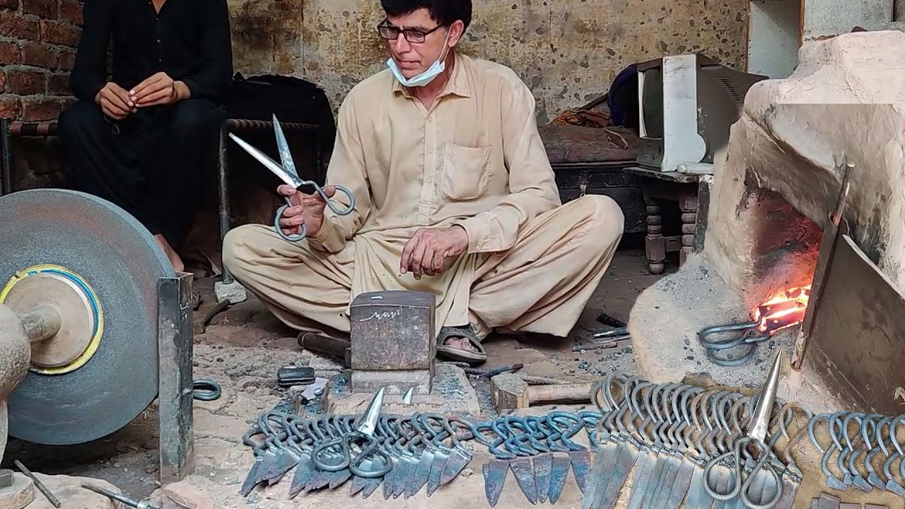 The Talented Blacksmith making a Scissors on a Road side Shop with wonderful Skills