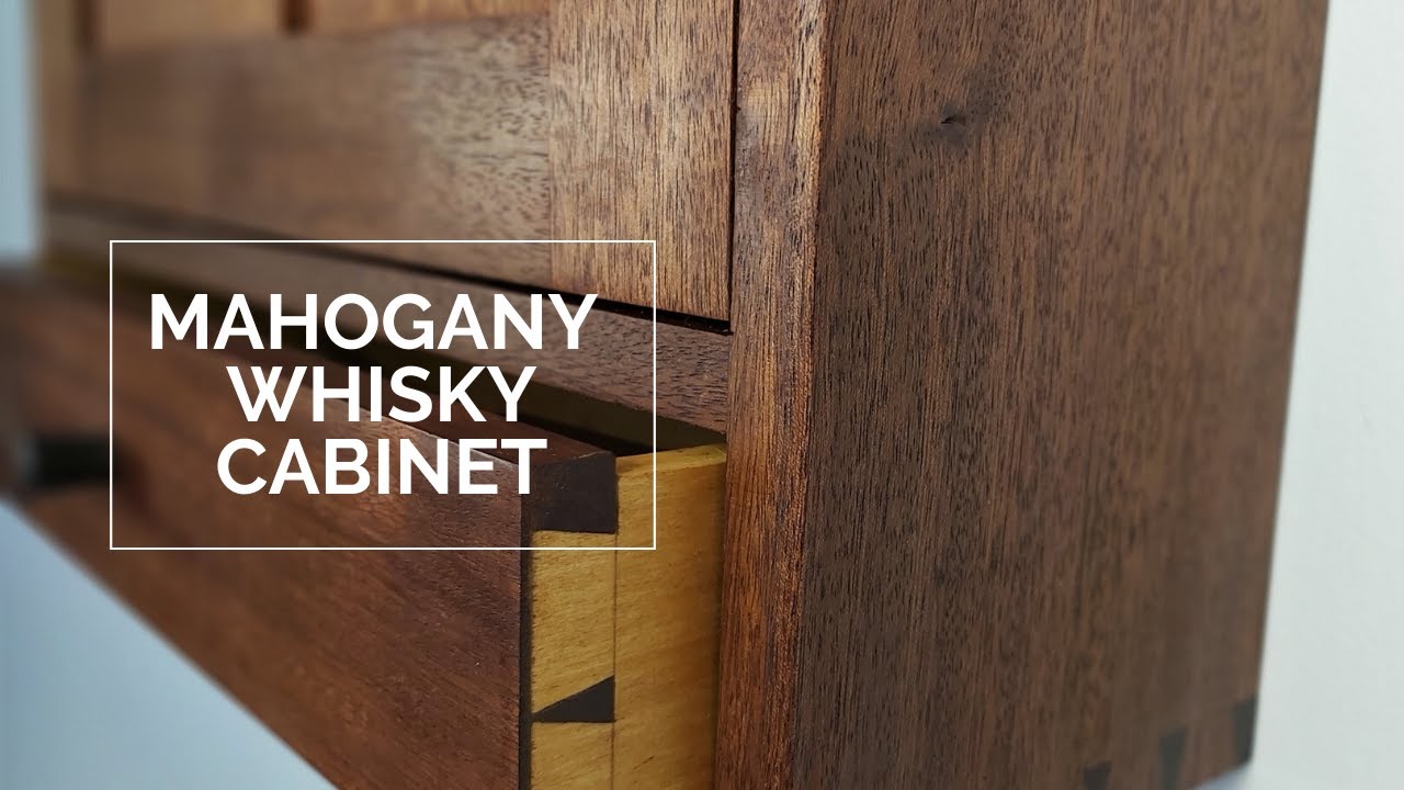 A MAHOGANY WHISKY CABINET