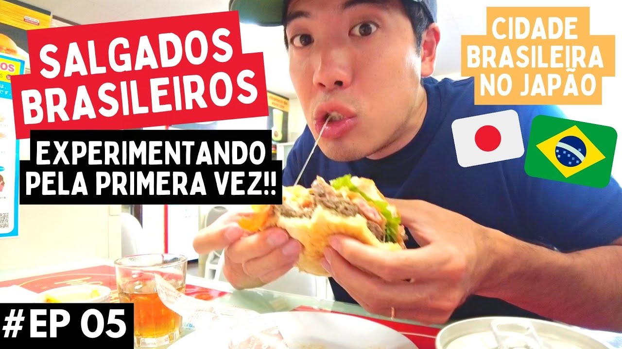 Japonês experimentando pela primeira vez salgados brasileiros na cidade brasileira do Japão.